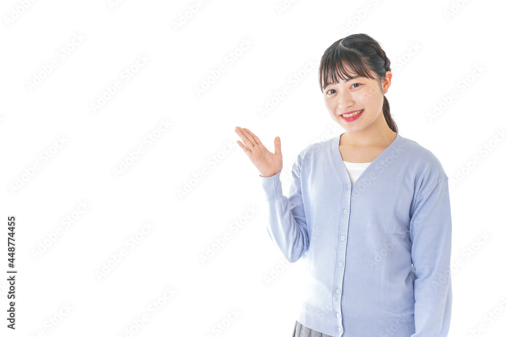 指を指す若い女性 指を指す若い女性