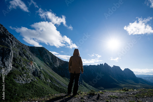 Hiker on high altitude mountain top