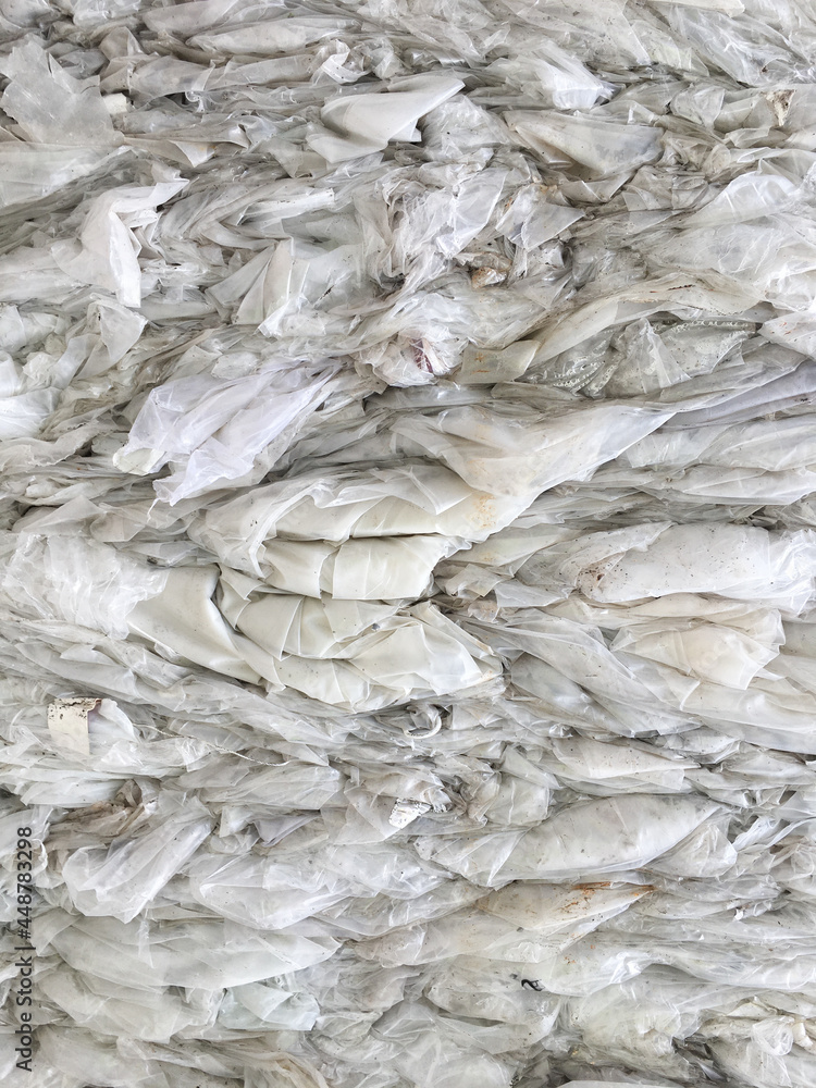 pressed transparent plastic bags. waste. processing. ecology. pressed transparent plastic bags. waste. processing. ecology.