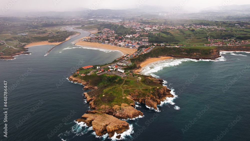 In this imagen you can see Locos Beach in Suances, Cantabria, Spain. Furthermore you can see the cliffs of this town. This town is the paradise of the surfers. 