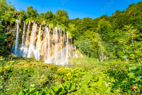 Fototapeta Naklejka Na Ścianę i Meble -  Beautiful waterfalls and lakes at Plitvice national nature park, Croatia. Fresh water stream in peaceful nature. Harmony and meditation, concept of peace and meditation in nature.