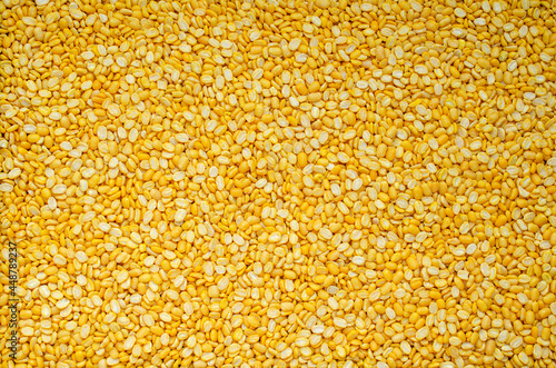 Group of dry organic split peeled mung bean background, ready for healthy or sweet food ingredient