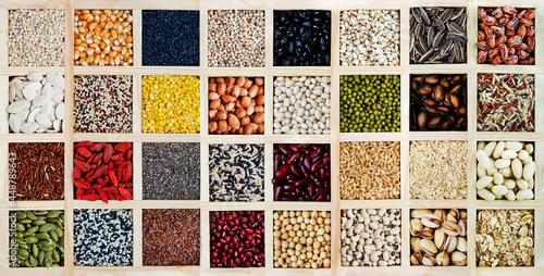 Fototapeta Naklejka Na Ścianę i Meble -  Collection of variety kinds natural cereal and grain seed in wooden box. Concept of healthy, diet, and carbohydrate food raw material or agricultural product