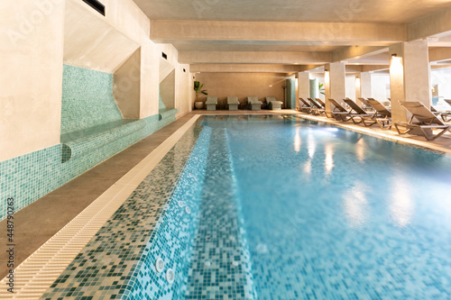 Indoor swimming pool in hotel spa and wellness center