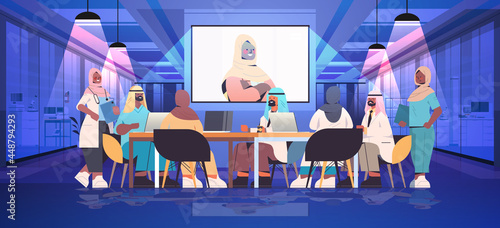 arab businesspeople having online conference business people discussing with businesswoman during video call