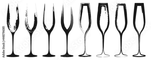 Set of black grunge champagne glasses icons isolated on a white background.