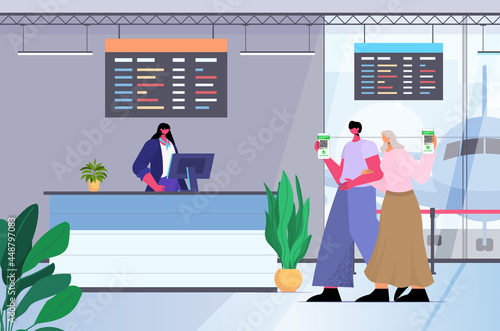 travelers using digital immunity passports at check in airport counter risk free covid-19 pcr certificate coronavirus immunity
