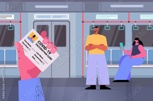 passenger in subway train with vaccination record card immunity passport risk free covid-19 pcr certificate