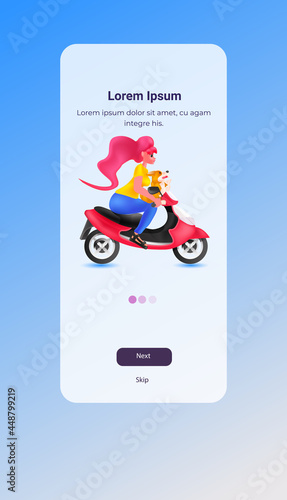 woman driving scooter girl with dog traveling on moped vertical