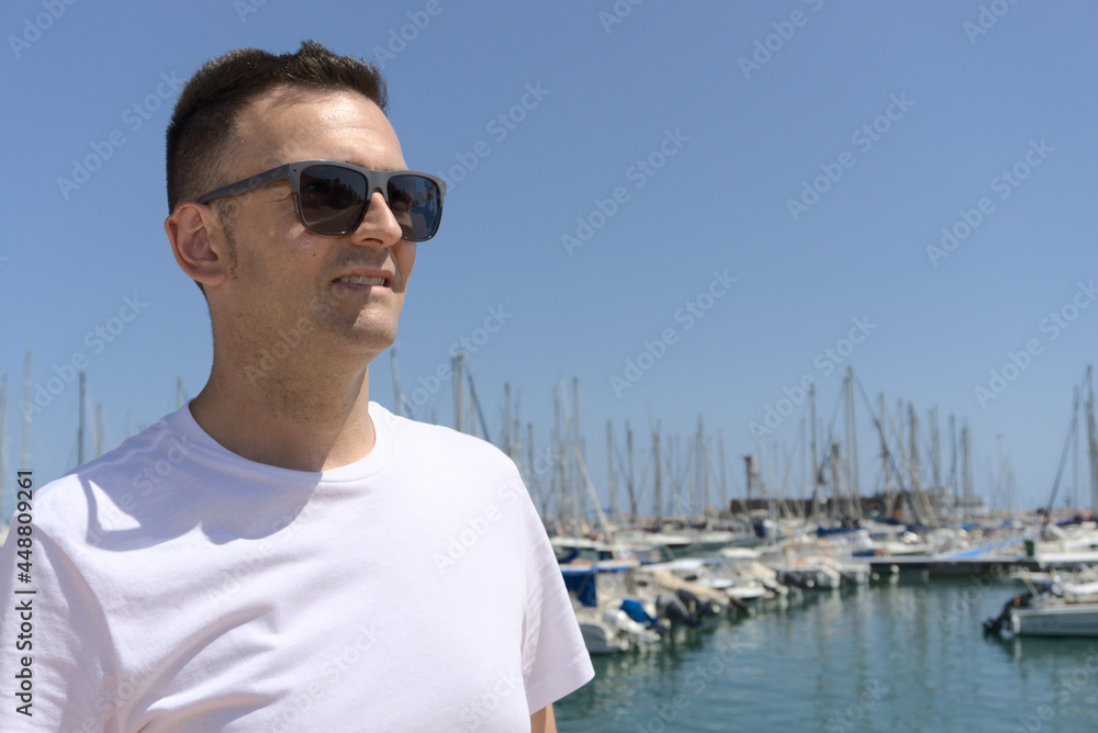 Happy middle aged caucasian adult male wearing white t-shirt. Lifestyle summer mockup.