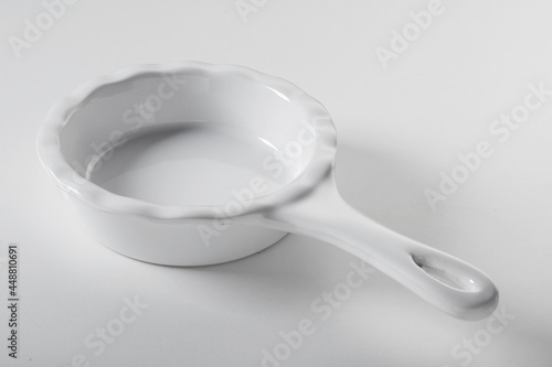 White ceramic bakeware with handle