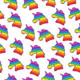 Color seamless pattern with anti-stress unicorn toys.