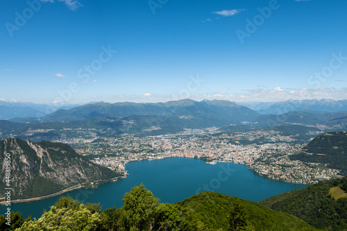 Gorgeous view from the hill top at Balcony of Italy, over Lake Lugano, city Lugano and other cities. The view go far into Switzerland, all to the way to the Swiss alps. Shot from the Italian side of t