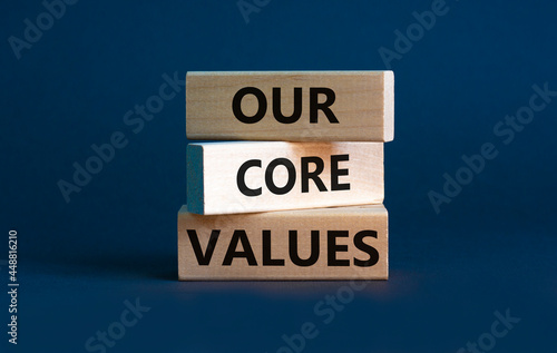 Our core values symbol. Concept words 'Our core values' on wooden blocks on a beautiful grey background. Business and our core values concept. Copy space.