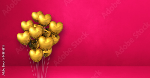 Gold heart shape balloons bunch on a pink wall background. Horizontal banner.