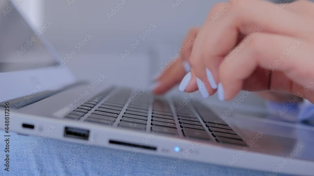 Woman hands with manicure typing on laptop computer keyboard - close up side view. Communication, workplace, business, education, freelance, internet, leisure time and technology concept Woman hands with manicure typing on laptop computer keyboard - close up side view. Communication, workplace, business, education, freelance, internet, leisure time and technology concept
