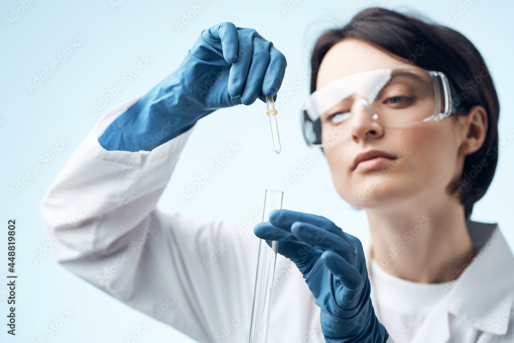 Fototapeta premium female scientist in white coat research laboratory Professional