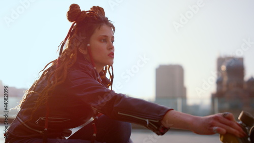 Bild auf Leinwand Young woman riding on rollerblades outside