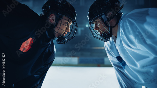 Photos Ice Hockey Rink Arena Game Start: Two Professional Players Aggressive Face off, Sticks Ready