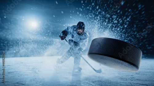 Canvas Print Ice Hockey Rink Arena: Professional Player Shooting the Puck with Hockey Stick