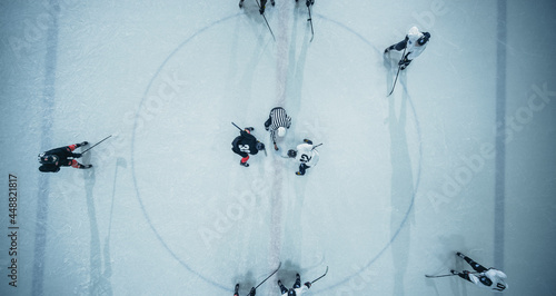 Fotografiet Top View Ice Hockey Rink Arena Game Start: Two Players Face off, Sticks Ready, Referee Ready to Drop the Puck