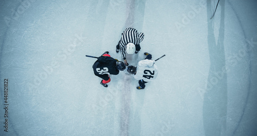 Photos Top View Ice Hockey Rink Arena Game Start: Two Players Face off, Sticks Ready, Referee Ready to Drop the Puck