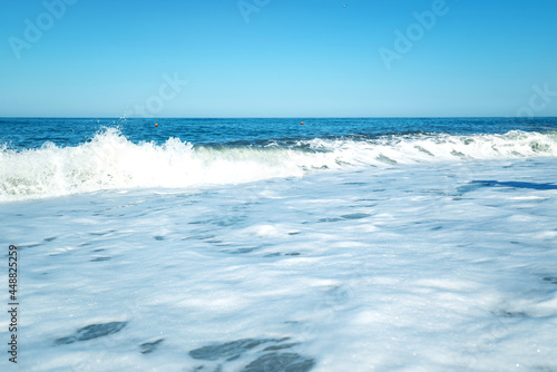 sea  sea blue wave with foam. Feeling calm  cool  relaxing. The idea for cold background and copy space on the top.