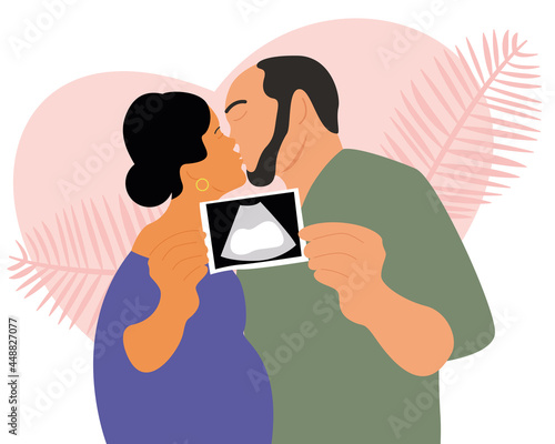 Young parents found out the gender of their unborn child. The couple holds an ultrasound picture in their hands. Parents and family.