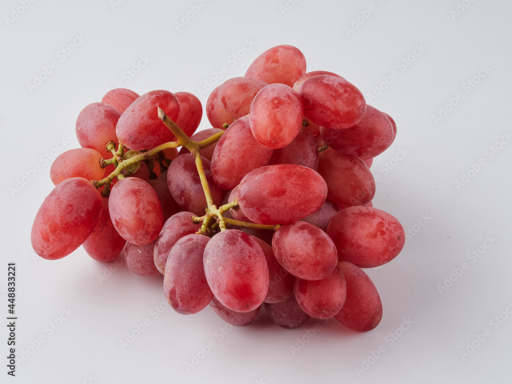 Fototapeta premium Grapes. Red grape. Grape branch isolated on white. With clipping path. Full depth of field.