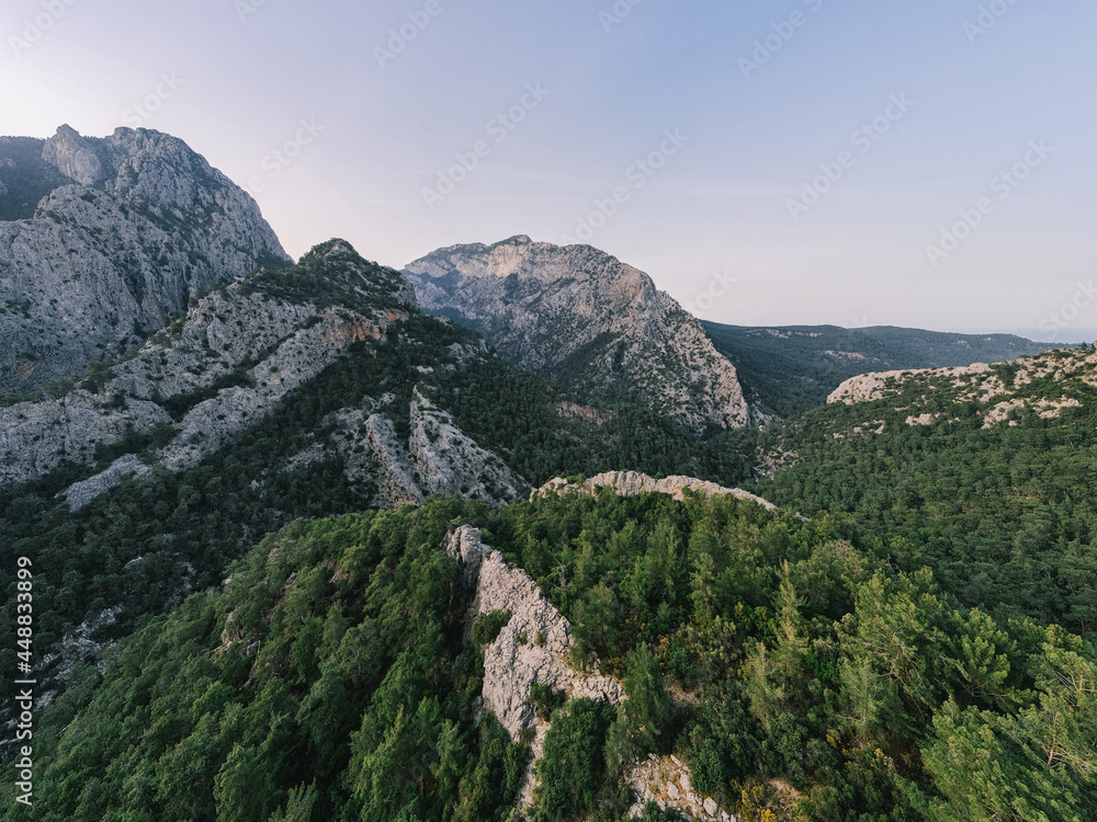 Panorama of countryside in mountain.Green forest on the hills, cliffs