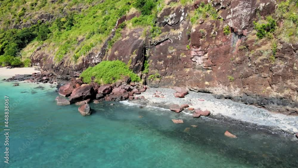 Drone Aerial view of Mayotte turquoise lagoon, white beach and navigating boats Drone Aerial view of Mayotte turquoise lagoon, white beach and navigating boats