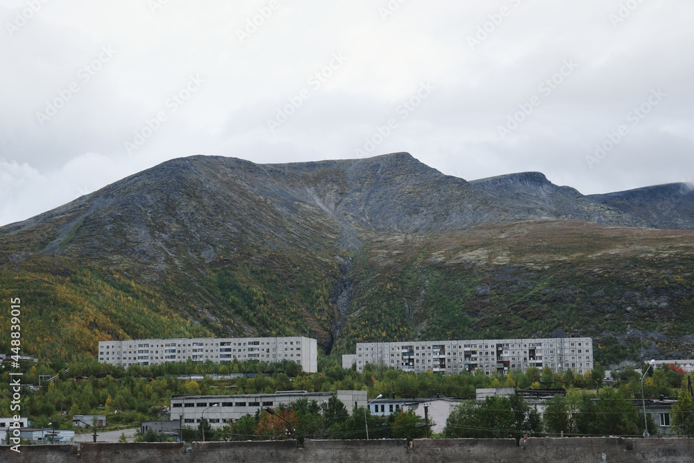 view of Soviet houses in the mountains in autumn
