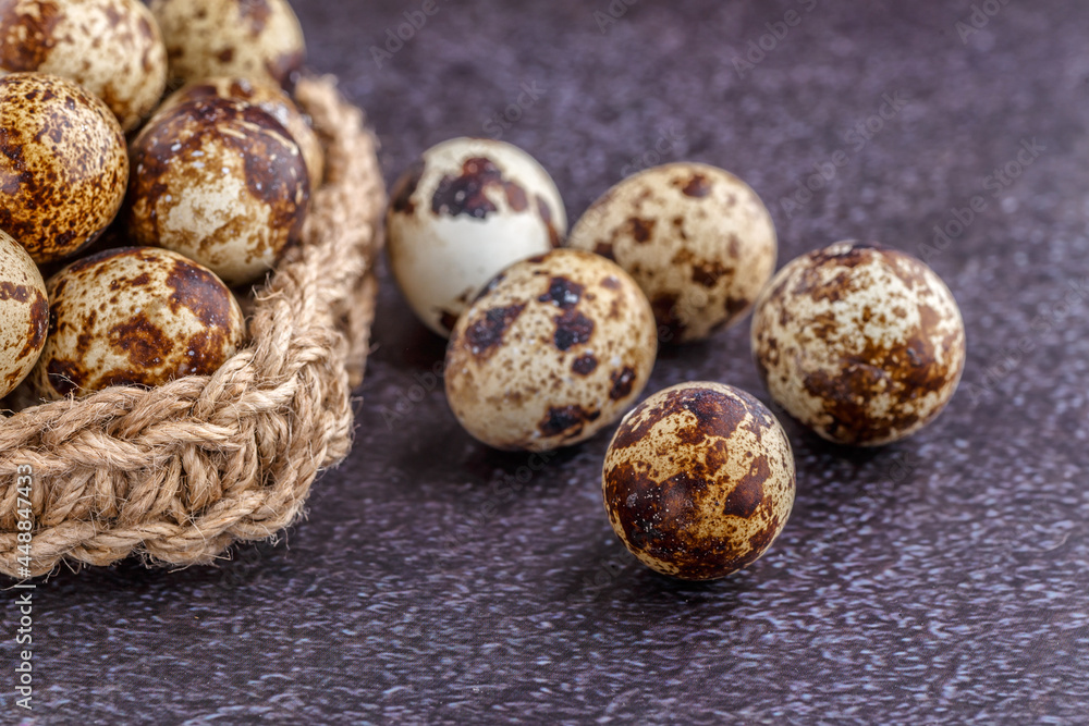 Quail eggs on the wooden plate. Quail eggs can be consumed by frying or boiling. In Indonesia quail eggs called telur puyuh. Quail eggs on the wooden plate. Quail eggs can be consumed by frying or boiling. In Indonesia quail eggs called telur puyuh.