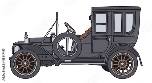 The vectorized hand drawing of a vintage black limousine