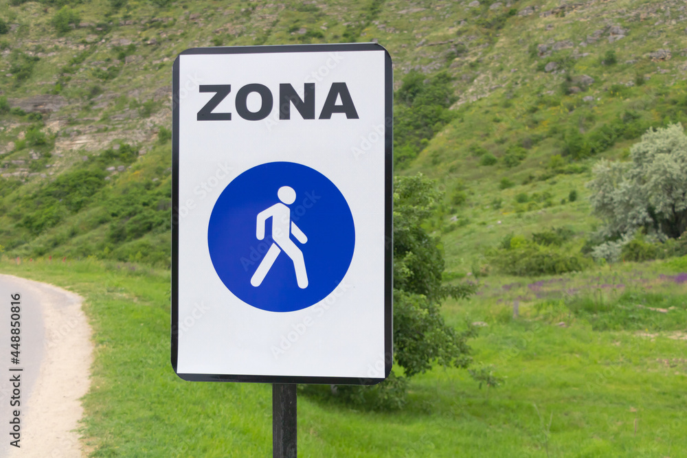 Pedestrian zone sign in the countrysid - Green nature background Pedestrian zone sign in the countrysid - Green nature background