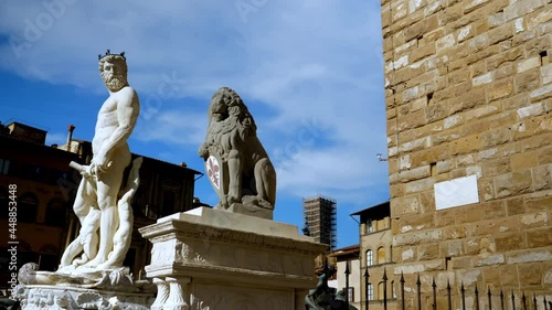 Fountain of Neptune and Lion marzocco on Piazza della Signoria in front of the Palazzo Vecchio, Florence, Italy