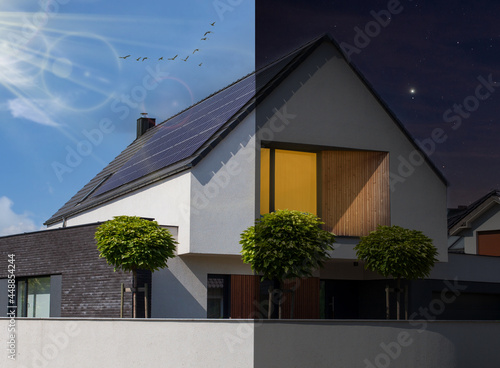 Solar panels on the roof. Beautiful modern house day and night. Ecology idea - solar energy at home