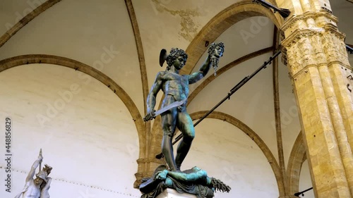 Bronze statue of Perseus in motion with the head of Medusa on Piazza della Signoria, main square in Florence, Italy