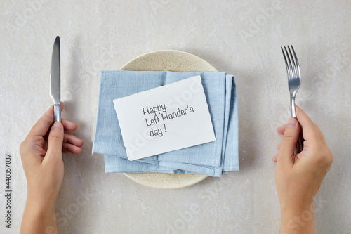 Happy Lefthanders Day, for August 13 with table setting showing reverse cutlery placing.