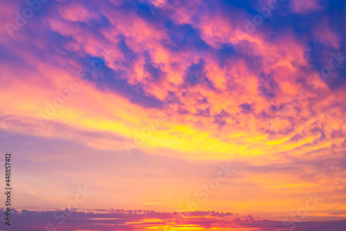 Dramatic bright sky at sunset. Panorama, background for text. Blurred focus. © Natalia