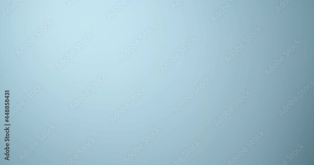 Mature woman pushing something on color background Mature woman pushing something on color background