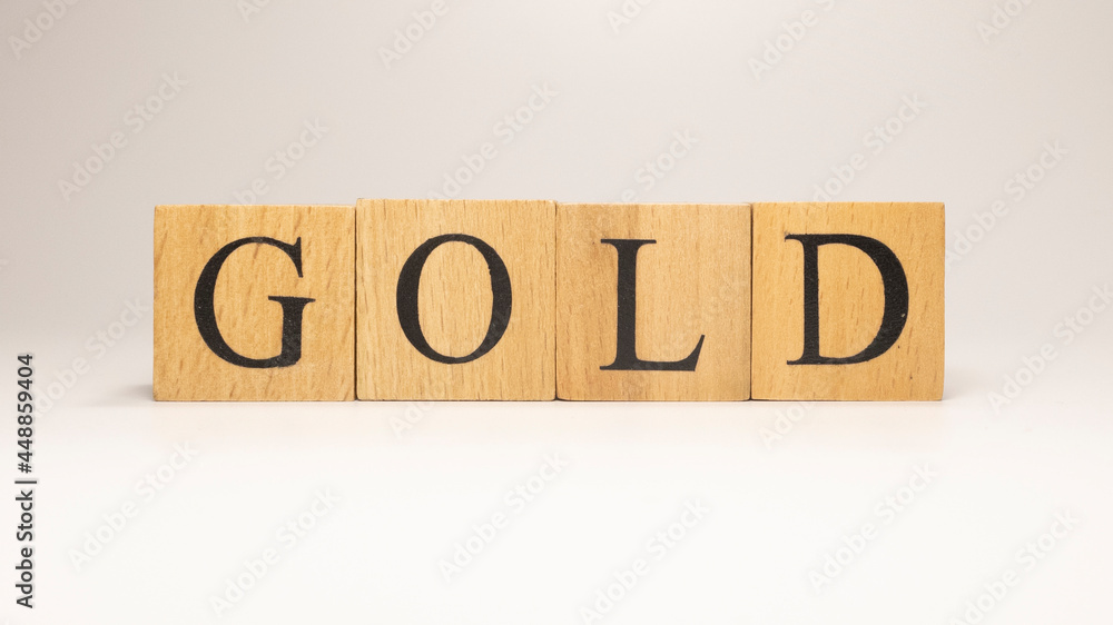 Gold name was created from wooden letter cubes. Economics and finance. Gold name was created from wooden letter cubes. Economics and finance.
