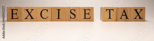 Konstfotografi The name Excise tax was created from wooden letter cubes