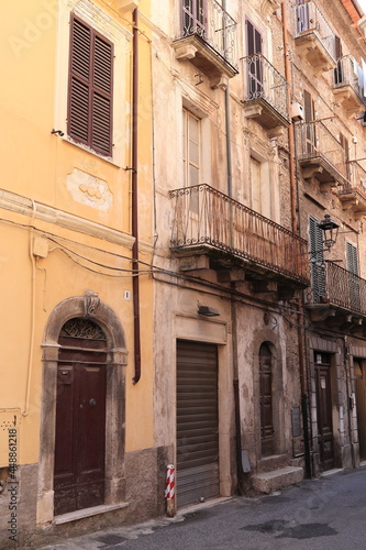 Fototapeta Naklejka Na Ścianę i Meble -  Antrodoco Street View with Old House Facades and Iron Balconies, Central Italy