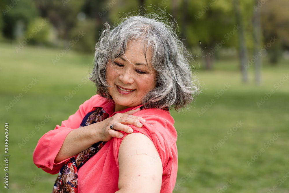 Senior Woman Proudly Shows Off Arm Muscles After Yoga Senior Woman Proudly Shows Off Arm Muscles After Yoga