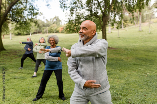 Group of Seniors Work Out With Martial Arts  photo