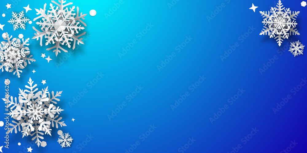 Christmas background of paper snowflakes with soft shadows, white on blue background