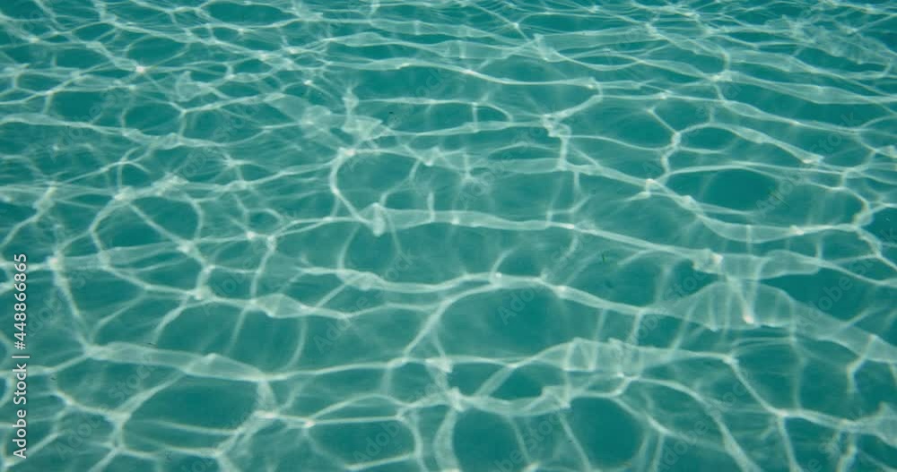Water texture underwater, light reflecting under water Water texture underwater, light reflecting under water