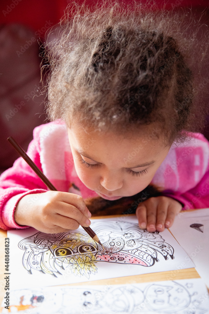 Toddler girl practicing her colouring
Toddler girl practicing her colouring