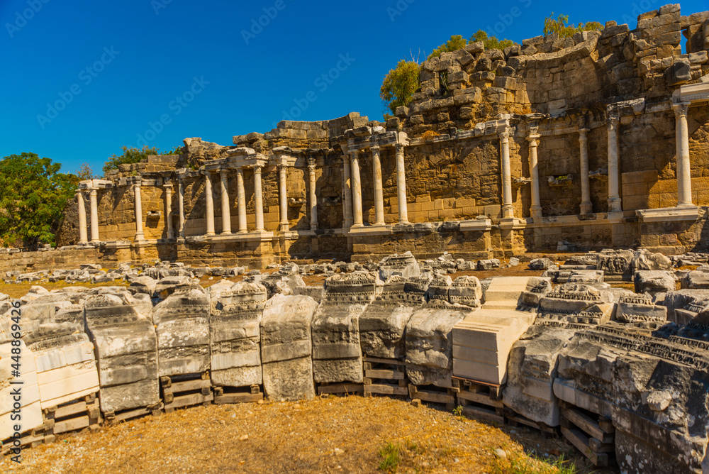 Fototapeta premium SIDE, TURKEY: Nympheum fountain in the city of Side on a sunny summer day on the background of the blue sky